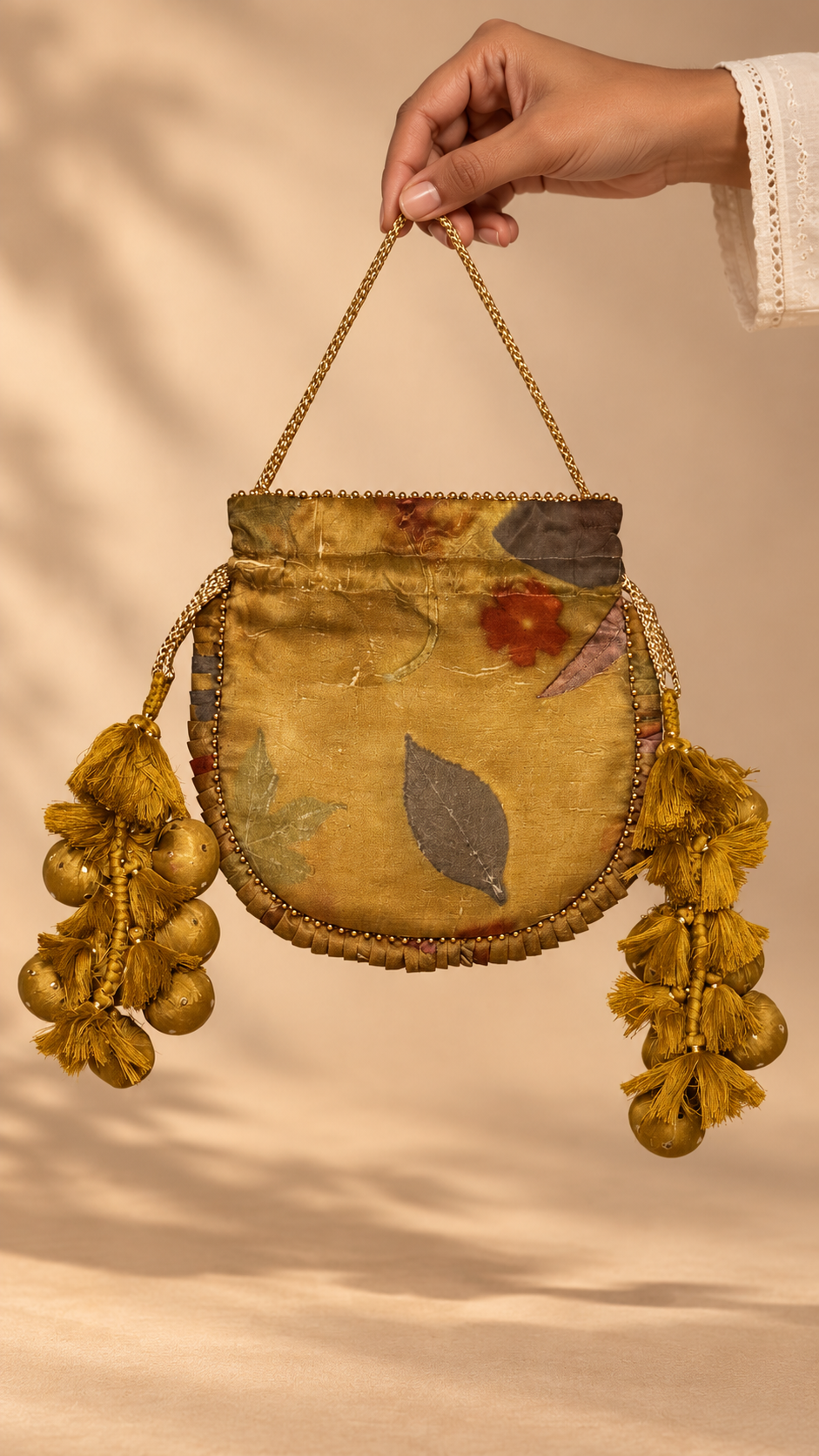 Mustard Kanchi Eco-print Potli — studio view
