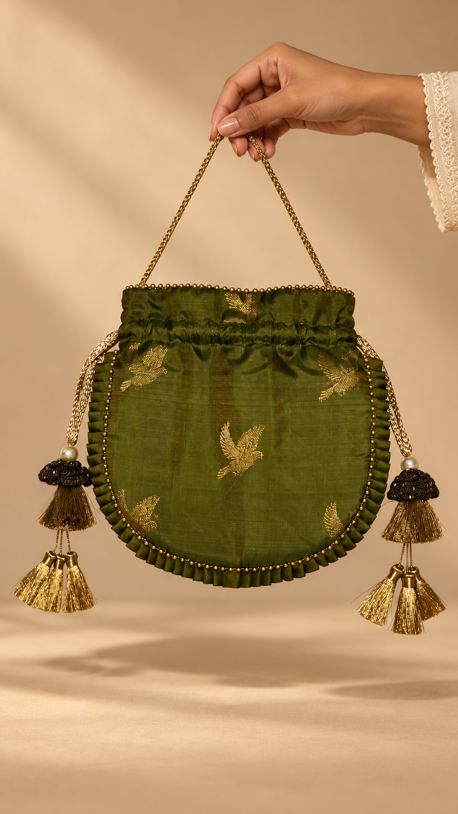 Olive Green Flying Bird Potli — studio view